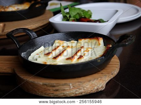 Fried Halloumi Cheese Still Hot In The Pan.