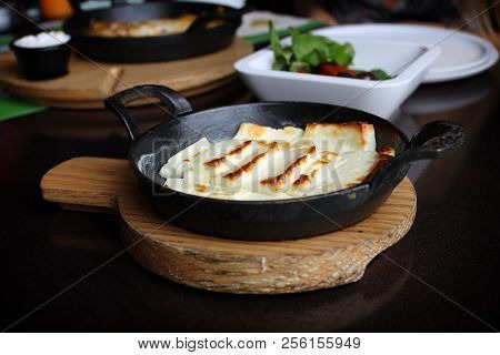Fried Halloumi Cheese Still Hot In The Pan.