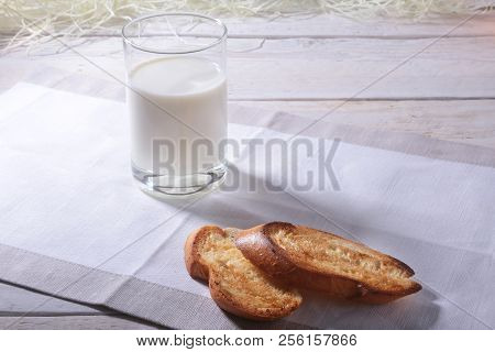 Morning Breakfast Set With Orange Jam On Bread Toast And Milk In Glass.