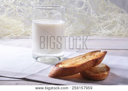 Morning Breakfast Set With Orange Jam On Bread Toast And Milk In Glass.