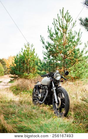 Silver Caferacer Motorcycle Parking On A Country Road. Everything Is Ready For Having Fun Driving Th