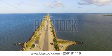 Aerial view banks of famous Texas City Dike, a levee that projects nearly 5miles south-east into mou