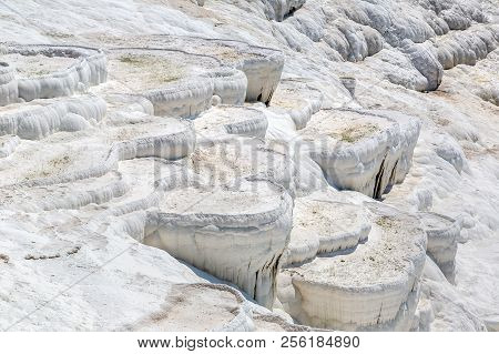 Travertine Pools And Terraces In Pamukkale, Turkey In A Beautiful Summer Day