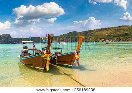 Traditional Thai Longtail Boat At Log Dalum Beach On Phi Phi Don Island, Thailand In A Summer Day