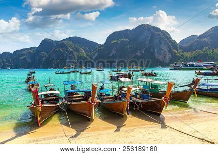 Traditional Thai Longtail Boat At Log Dalum Beach On Phi Phi Don Island, Thailand In A Summer Day