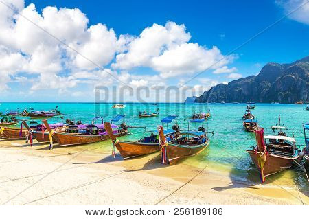 Traditional Thai Longtail Boat At Log Dalum Beach On Phi Phi Don Island, Thailand In A Summer Day