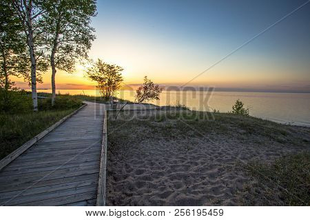 Michigan Boardwalk Scenic Sunset. Sunset On The Coast Of Lake Superior In The Hiawatha National Fore