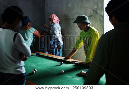 Sapa, Baha/ Vietnam - Aug 5 2010: Local Villagers Playing Pool Billiards At A Small Bar Next To The 
