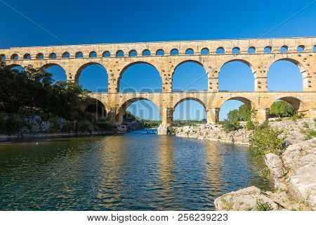 Remoulins,france-august 12, 2016:the Famous Pont Du Gard Roman Aqueduct During A Sunny Day