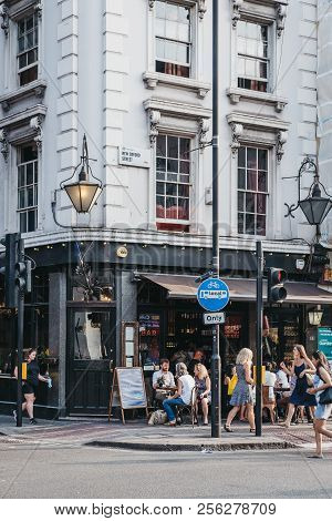 London, Uk - July 24, 2018: People Drinking Outside The Old Crown Pub On New Oxford Street, London. 