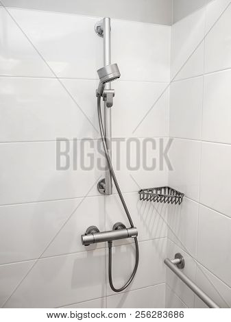 Shower Head And Shower Holder. Interior Of Modern Shower Head In Bathroom At Home. Modern Design Of 