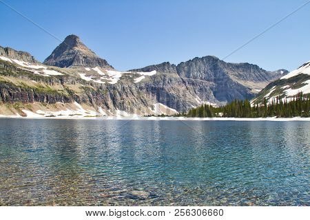 Image From The Shore Of A Clear Mountain Lake.  This Is Hidden Lake In Glacier National Park.