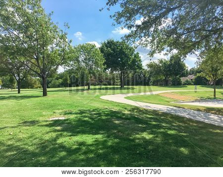 Beautiful Green Park With Pathway Trail In Coppell, Texas, Usa