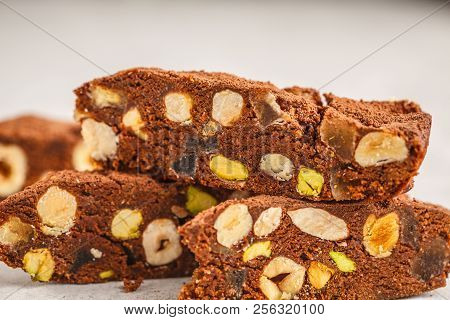 Italian Dessert Panforte With Nuts, Chocolate And Candied Fruits. White Background, Italian Dessert 