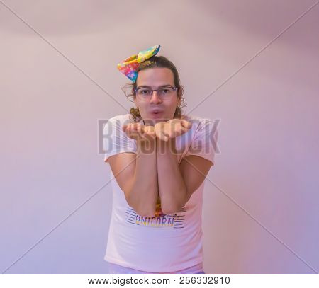 Lgbt Funny Gender Queer Person Making A Blow Kiss Gesture Close Up Isolation