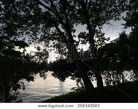 The Sunset Photo Taken In Changsha, China, The Sunset Glow Is Slowly Disappearing Through The Leaves