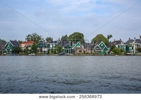 Zaanse Schans Village With River And Houses In The Netherlands.