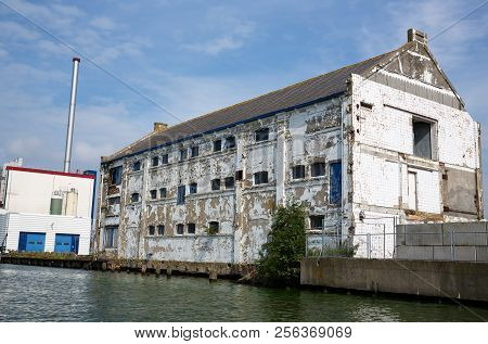 Zaanse Schans, Netherlands, August 19, 2015 - Industrial Area With Old Building And Containers.