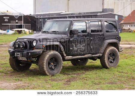 Copenhagen, Denmark - September 1, 2018: Close Up Of Dirty Jeep Wrangler After Driving Heavy Off-roa