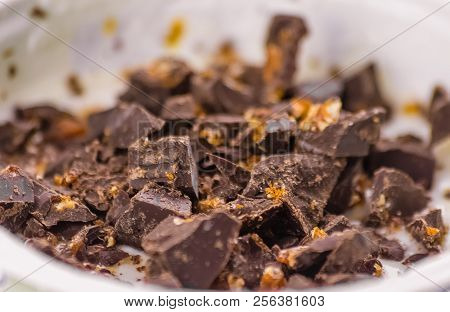 Close-up Of White Yogurt And Pieces Of Brown Chocolate, Health Food And Nutrition Concpet