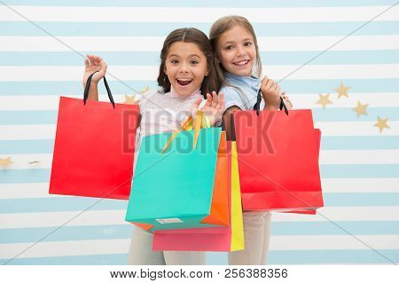 Sale. Happy Little Girl Bought A Lot On Big Sale. Little Girls On Shopping With Happy Face. Go Shopp