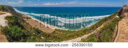 Top Aerial View Of Beauty Bali Beach. Empty Paradise Beach, Blue Sea Waves In Bali Island, Indonesia