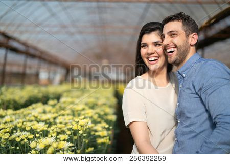 Romantic Couple on a Love Moment at Greenhouse in Holambra, Sao Paulo, Brazil