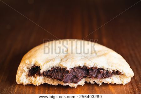 Chocolate Filled Cookies Cut In Half With Chocolate Cream With Copy Space Macro Shot
