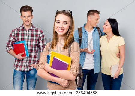 Sweetheart Stylish Trandy Youngster Girl Stands On The Background Of Classmates From The Faculty Emb