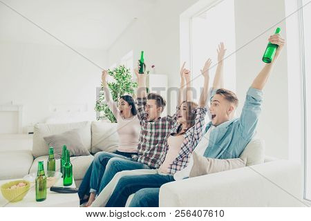 Profile Side View Photo Group Pof Four Emotional Guys Sit On The Couch Laugh, Relax, Rest And Raisin