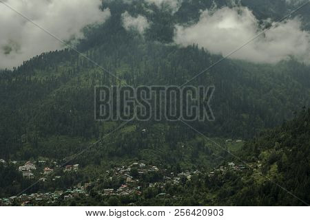 Heavy Cloud On The Green Mountain And Village
