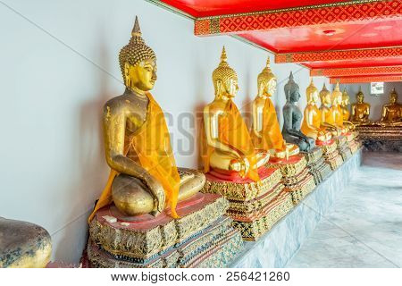Buddha Statues At Wat Pho, The Temple Of The Reclining Buddha In Bangkok, Thailand.
