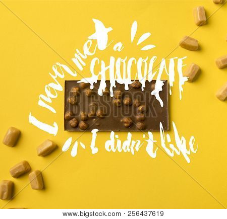 Top View Of Chocolate Bar With Scattered Iris Milk Candies Isolated On Yellow With I Never Met A Cho