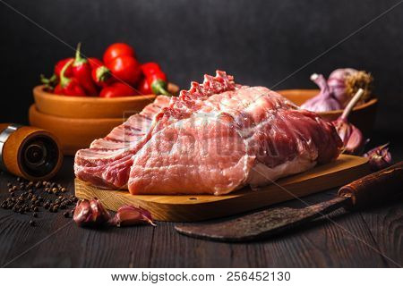 Fresh Pork Chop Raw With Ingredient On Datk Background