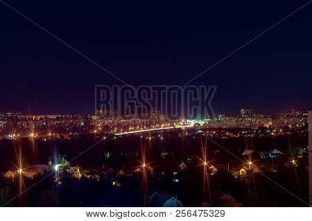 Long Exposure Night Photo. A Lot Of Lights Symbolized Big City Life At Night. Night City Illuminatio