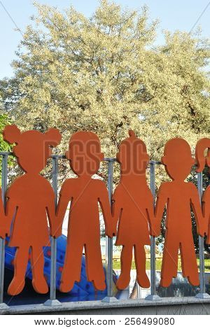 Colored Wooden Children, Symbol Of Peace, Art Object In The Park.