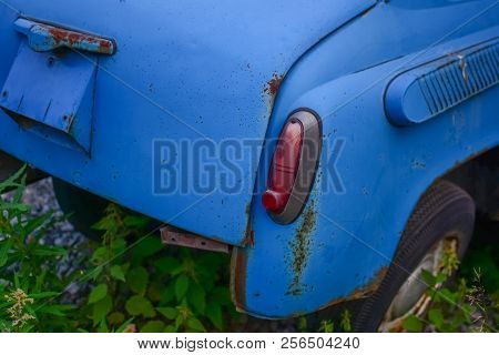 Raear Part Of Bright Blue Old Automobile With Htadlights