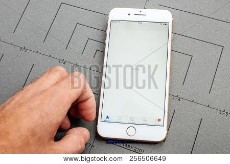 Paris, France - Sep 26, 2016: Male Hand Holding New Apple Iphone 7 8 Plus Smartphone After Unboxing 