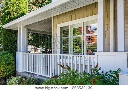 A Perfect Neighbourhood. Residential House Patio In Front Of Facade Window. Family House Veranda On 