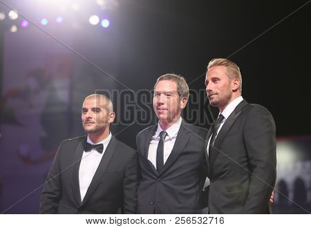Sofiane Zermani, Reda Kateb, Matthias Schoenaerts walk the red carpet ahead of the 'Close Enemies' screening duringon September 1, 2018 in Venice, Italy.  the 75th Venice Festival at Sala Grande  