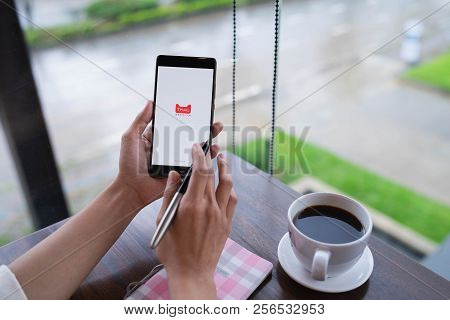 Chiang Mai, Thailand - August 18,2018: Woman Hands Holding Huawei With Tmall Apps On The Screen.tmal
