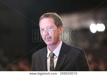 Reda Kateb walks the red carpet ahead of the 'Freres Ennemis (Close Enemies)' screening during the 75th Venice Film Festival at Sala Grande on September 1, 2018 in Venice, Italy.