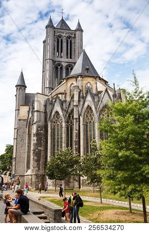 Ghent, Belgium - August 14, 2015 - The View Of The Saint Nicholas Church With People In The Historic