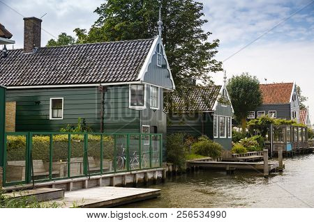 Zaanse Schans Village With River And Houses In The Netherlands.