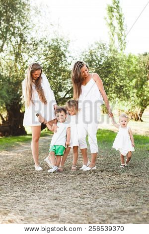 A Large Family With Homosexual Parents. Two Mothers.