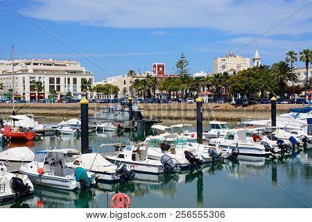 Ayamonte, Spain - June 11, 2017 - Motor Boats Moored In The Marina (puerto Ayamonte) With Town Build