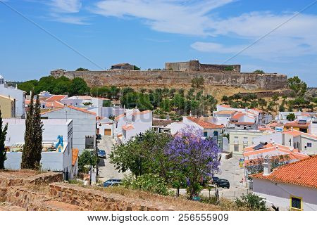 Castro Marim, Portugal - June 11, 2017 - Elevated View Of The Castle And Town Buildings With A Prett