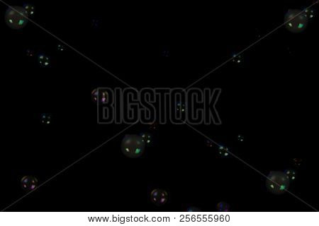 Floating Soap Bubbles Filled With Smoke On Black Background.soap Bubbles Filled With Smoke From An E