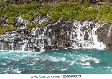 Hraunfossar Waterfalls - Western Iceland. The Water Seems To Appear From The Lava But Is A Spring Th