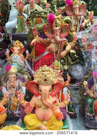 Plenty of various handcrafted idols of Ganesha selling in the shop during Ganesh Festival.